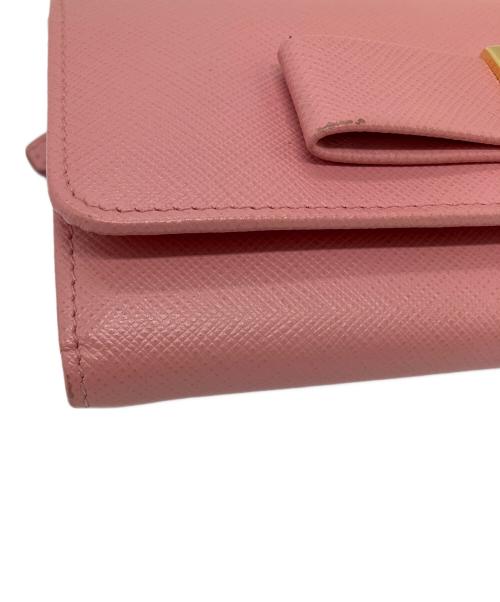 PRADA（プラダ）PRADA (プラダ) リボンZIP長財布　サフィアーノ ピンクの古着・服飾アイテム