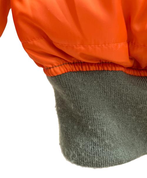 AVIREX（アヴィレックス）AVIREX (アヴィレックス) FACETASM (ファセッタズム) Dogs (ドッグス) BUG MA-1 JACKET カーキ×オレンジの古着・服飾アイテム