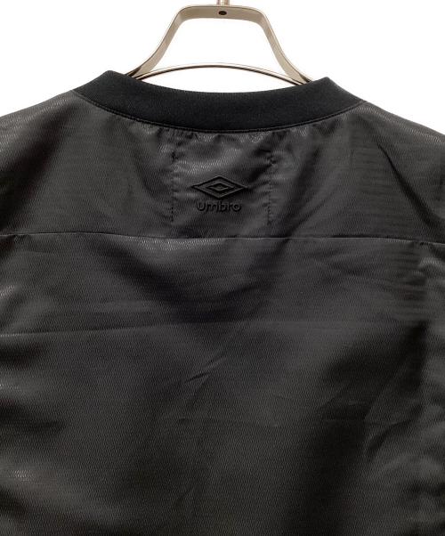 ALMOSTBLACK（オールモストブラック）ALMOSTBLACK (オールモストブラック) UMBRO (アンブロ) ウインドアップピステ ブラック サイズ:Lの古着・服飾アイテム