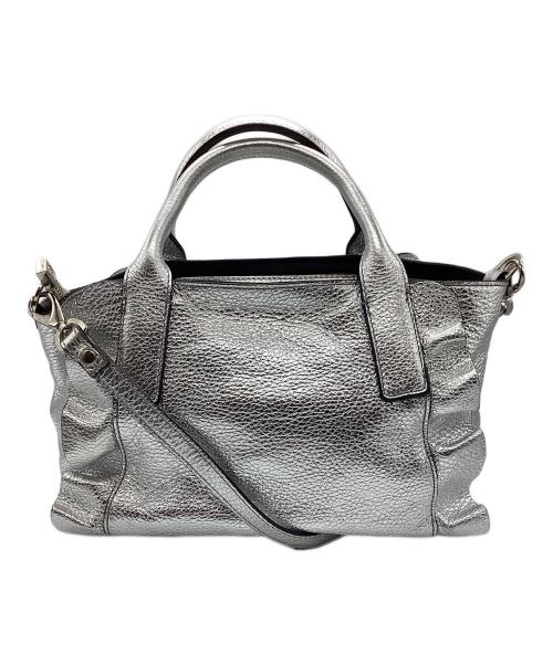 ripani（リパーニ）ripani (リパーニ) メタリックサイドフリルトート バッグ シルバーの古着・服飾アイテム