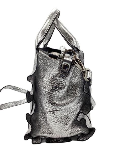 ripani（リパーニ）ripani (リパーニ) メタリックサイドフリルトート バッグ シルバーの古着・服飾アイテム