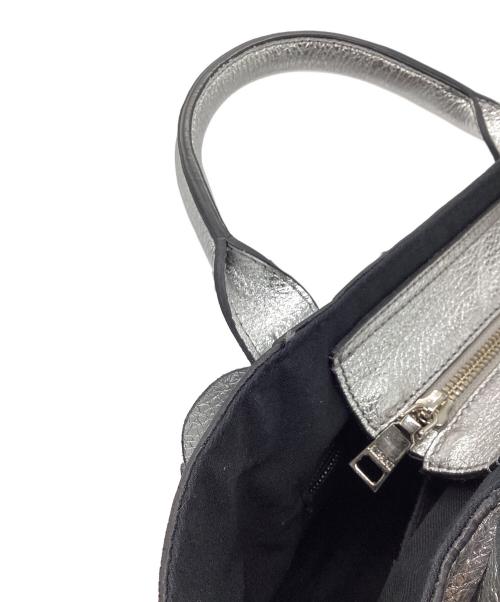 ripani（リパーニ）ripani (リパーニ) メタリックサイドフリルトート バッグ シルバーの古着・服飾アイテム