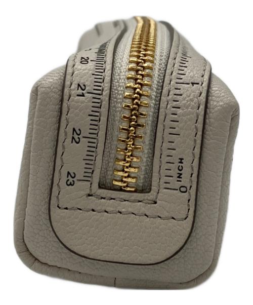 ANYA HINDMARCH（アニヤ・ハインドマーチ）ANYA HINDMARCH (アニヤ・ハインドマーチ) オールオーバーステッカー ペンケース ベージュの古着・服飾アイテム