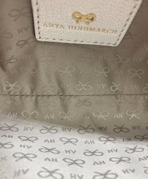 ANYA HINDMARCH（アニヤ・ハインドマーチ）ANYA HINDMARCH (アニヤ・ハインドマーチ) オールオーバーステッカー ペンケース ベージュの古着・服飾アイテム