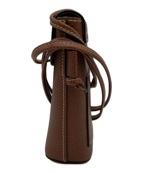 LONGCHAMP（ロンシャン）LONGCHAMP (ロンシャン) エピュレ スマートフォンケース（フラップ付き） ブラウンの古着・服飾アイテム