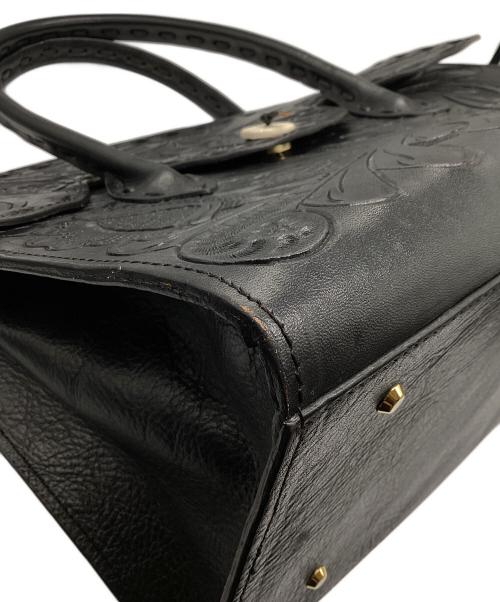 Carving Tribes（カービングトライブス）Carving Tribes (カービングトライブス) celia grande(セリア グランデ)の古着・服飾アイテム