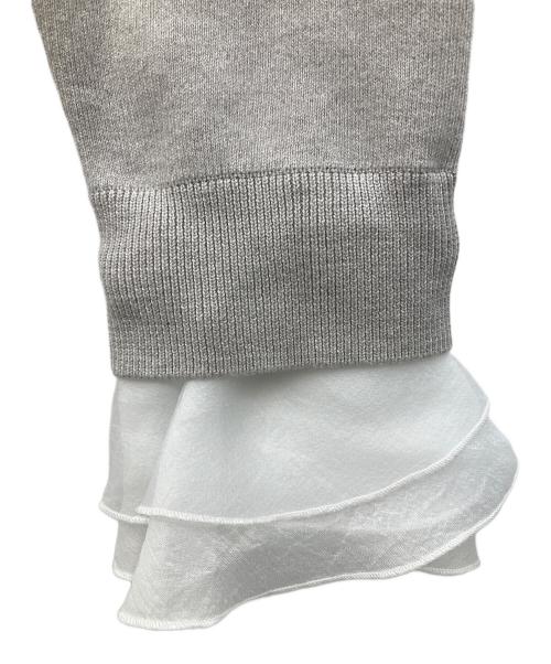 UNITED ARROWS（ユナイテッドアローズ）UNITED ARROWS (ユナイテッドアローズ) オーガンジー ラッフルフリル 4WAY ニット グレー サイズ:FREE 未使用品の古着・服飾アイテム