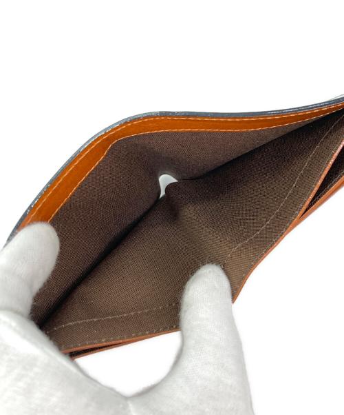 TAVARAT（タバラット）TAVARAT (タバラット) 2つ折り財布 ブラックの古着・服飾アイテム