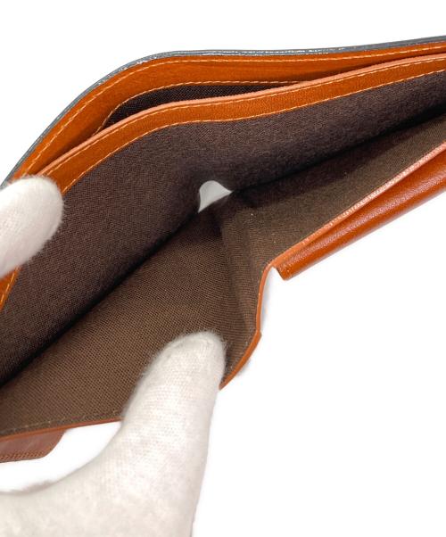 TAVARAT（タバラット）TAVARAT (タバラット) 2つ折り財布 ブラックの古着・服飾アイテム