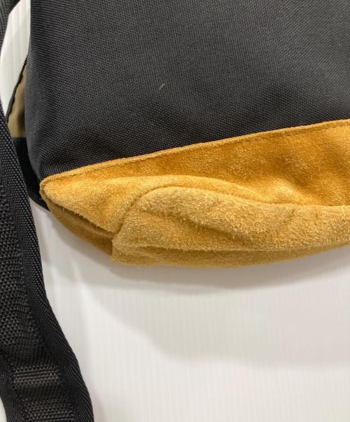 ANONYM CRAFTSMAN DESIGN（アノニムクラフツマンデザイン）ANONYM CRAFTSMAN DESIGN (アノニムクラフツマンデザイン) STIFF (スティッフ) スタッズメッセンジャーバッグ ブラックの古着・服飾アイテム