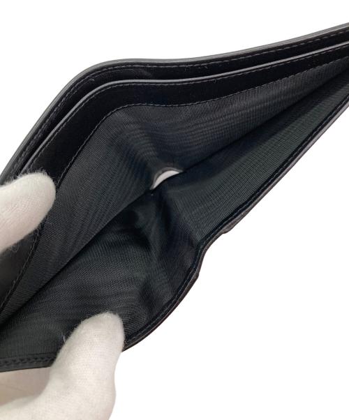 Salvatore Ferragamo（サルヴァトーレ フェラガモ）Salvatore Ferragamo (サルヴァトーレ フェラガモ) 2つ折り財布 ブラックの古着・服飾アイテム