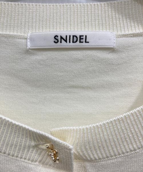 Snidel（スナイデル）Snidel (スナイデル) フラワーモチーフワンポイントカーディガン アイボリー サイズ:F 未使用品の古着・服飾アイテム