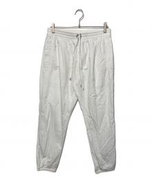 UNUSED（アンユーズド）の古着「ナイロンパンツ」｜ホワイト
