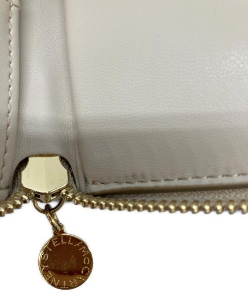 STELLA McCARTNEY（ステラマッカートニー）STELLA McCARTNEY (ステラマッカートニー) ラウンドファスナー財布　ラウンドファスナー パンチング ステラロゴ ベージュの古着・服飾アイテム