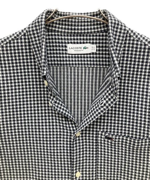 LACOSTE（ラコステ）LACOSTE (ラコステ) クールマックスブレンドジャガード半袖チェックシャツ ホワイト×ブラック サイズ:US Mの古着・服飾アイテム