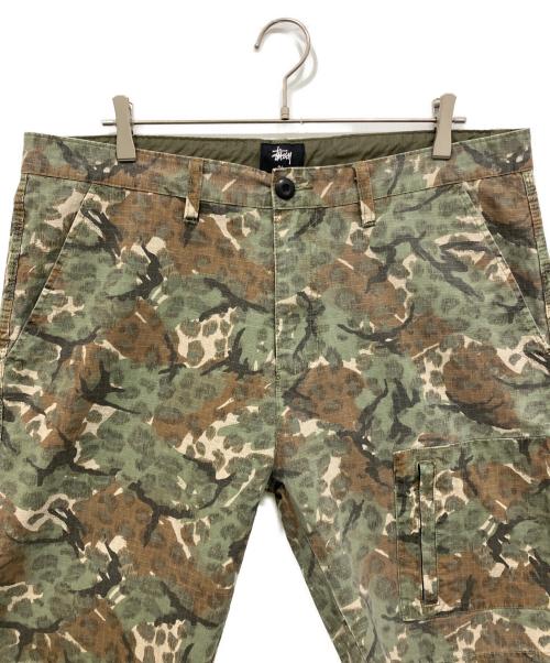 stussy（ステューシー）stussy (ステューシー) RIPSTOP CAMO POCKET SHORT　ハーフパンツ カーキ サイズ:36の古着・服飾アイテム