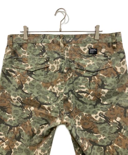 stussy（ステューシー）stussy (ステューシー) RIPSTOP CAMO POCKET SHORT　ハーフパンツ カーキ サイズ:36の古着・服飾アイテム