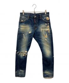 DSQUARED2（ディースクエアード）の古着「CLASSIC KENNY TWIST JEAN　ハードクラッシュ加工デストロイドデニムパンツ」｜インディゴ