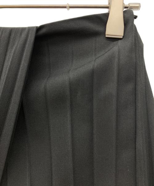 DES PRES（デ プレ）DES PRES (デ プレ) ハイツイストギャバジン イレギュラーヘムプリーツスカート ブラック サイズ:34の古着・服飾アイテム