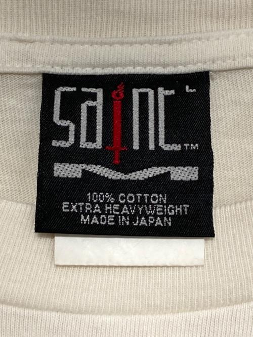 SAINT MICHAEL（セントマイケル）SAINT MICHAEL (セントマイケル) SS TEE / SAINT WAR / WHITE  オフホワイト サイズ:Lの古着・服飾アイテム