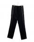 N°21（ヌメロヴェントゥーノ）の古着「サイドライントラックパンツ」｜ブラック