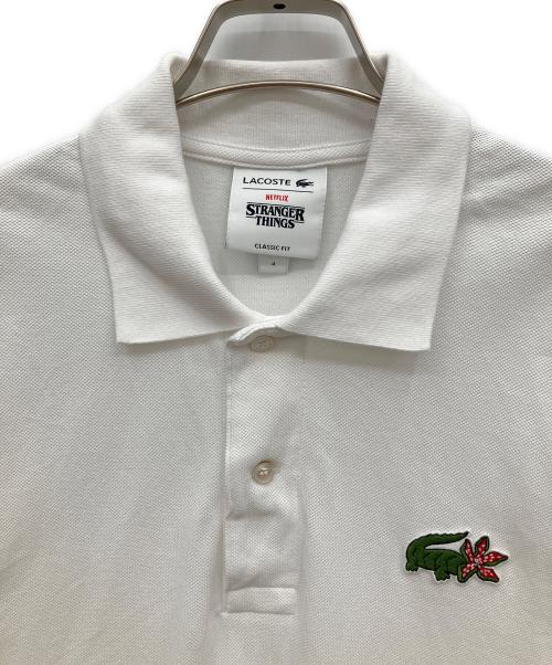 LACOSTE（ラコステ）LACOSTE (ラコステ) STRANGER THINGS (ストレンジャーシングス) ポロシャツ ホワイト サイズ:4の古着・服飾アイテム