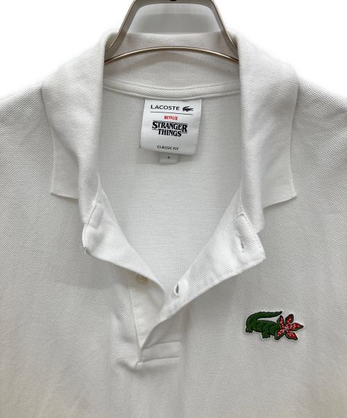 LACOSTE（ラコステ）LACOSTE (ラコステ) STRANGER THINGS (ストレンジャーシングス) ポロシャツ ホワイト サイズ:4の古着・服飾アイテム