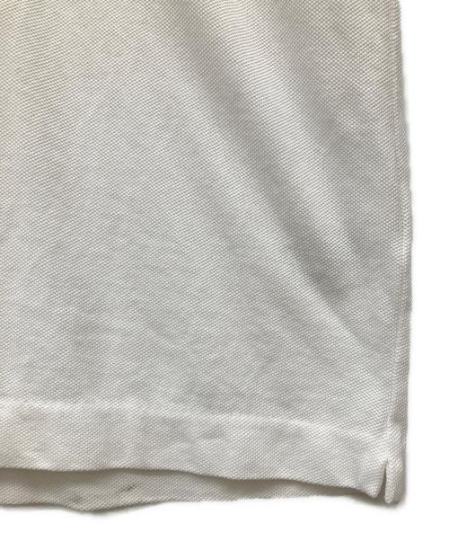LACOSTE（ラコステ）LACOSTE (ラコステ) STRANGER THINGS (ストレンジャーシングス) ポロシャツ ホワイト サイズ:4の古着・服飾アイテム