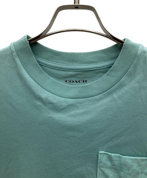 COACH（コーチ）COACH (コーチ) クロップド Tシャツ・シグネチャー ポケット ティール サイズ:XSの古着・服飾アイテム
