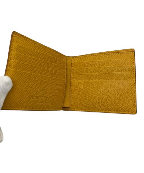 BURBERRY（バーバリー）BURBERRY (バーバリー) 2つ折り財布 イエローの古着・服飾アイテム