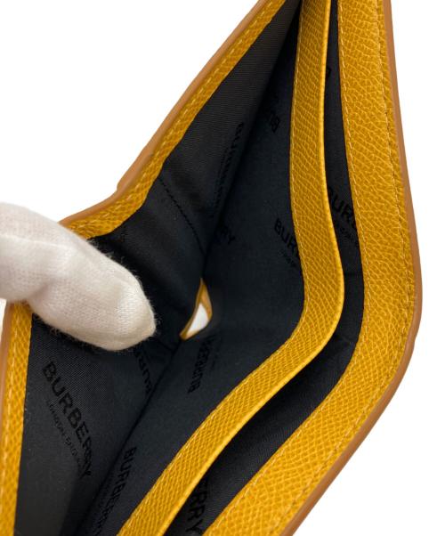 BURBERRY（バーバリー）BURBERRY (バーバリー) 2つ折り財布 イエローの古着・服飾アイテム