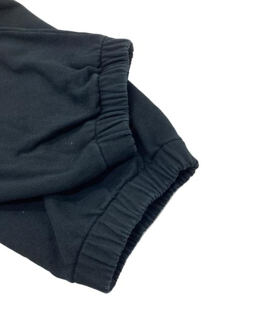 unknown（アンノーン）Unknown (アンノウン) Cross Rhinestone Jogger Pants ブラック サイズ:Mの古着・服飾アイテム