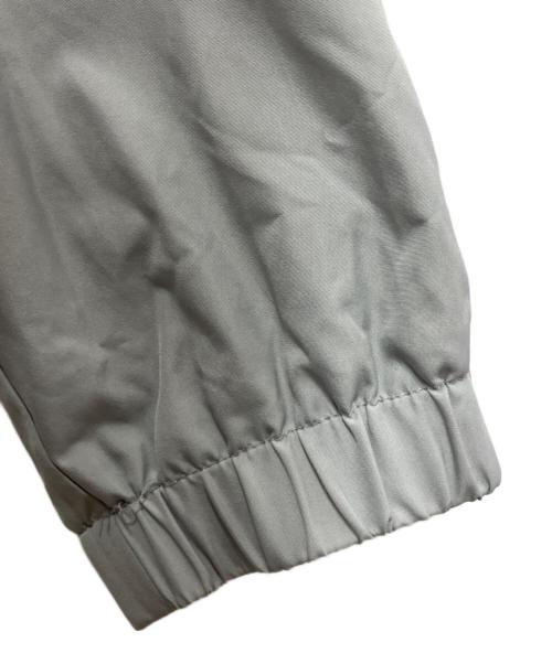 UMBRO（アンブロ）UMBRO (アンブロ) Manchester City ウォームアップジャケット グレー サイズ:USA　Mの古着・服飾アイテム