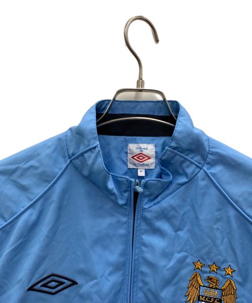 UMBRO（アンブロ）UMBRO (アンブロ) Manchester City トラックジャケット ブルー サイズ:Mの古着・服飾アイテム
