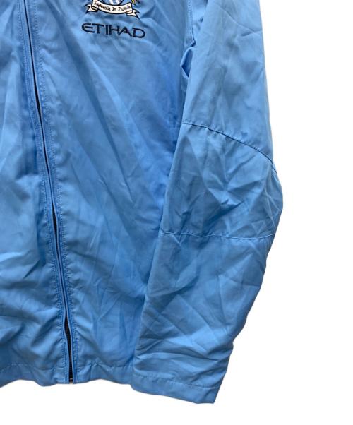UMBRO（アンブロ）UMBRO (アンブロ) Manchester City トラックジャケット ブルー サイズ:Mの古着・服飾アイテム