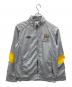 UMBRO（アンブロ）の古着「Manchester City トラックジャケット」｜グレー