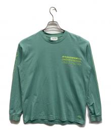 LACOSTE（ラコステ）の古着「グラフィカルブランドネームロゴマルチプリントロングスリーブTシャツ」｜グリーン