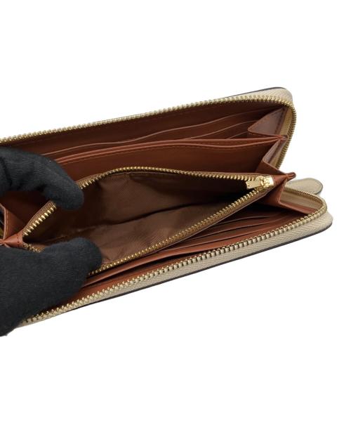 COACH（コーチ）COACH (コーチ) アコーディオンジップウォレット リジェネラティブレザー ミニーマウス ベージュの古着・服飾アイテム