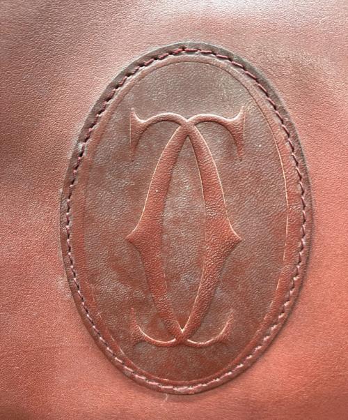 Cartier（カルティエ）Cartier (カルティエ) 巾着ショルダーバッグ ボルドーの古着・服飾アイテム