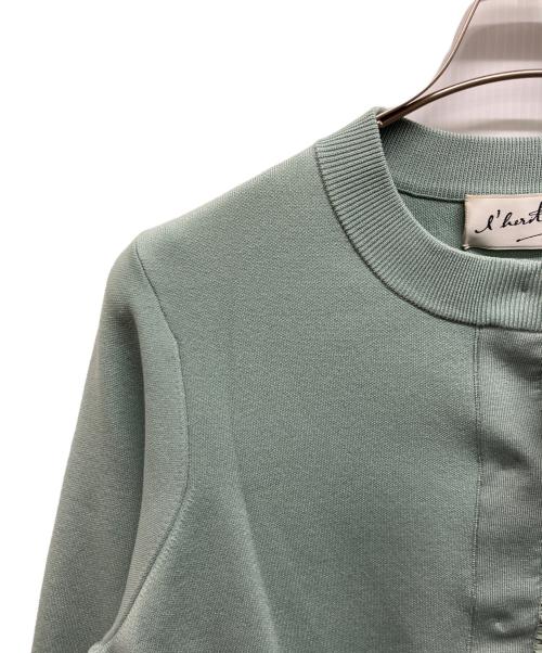 l’heritage martinique（レリタージュ マルティニーク）l’heritage martinique (レリタージュ マルティニーク) タフタフリルカーディガン グリーン サイズ:Freeの古着・服飾アイテム