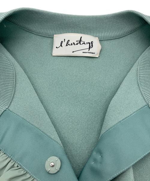 l’heritage martinique（レリタージュ マルティニーク）l’heritage martinique (レリタージュ マルティニーク) タフタフリルカーディガン グリーン サイズ:Freeの古着・服飾アイテム