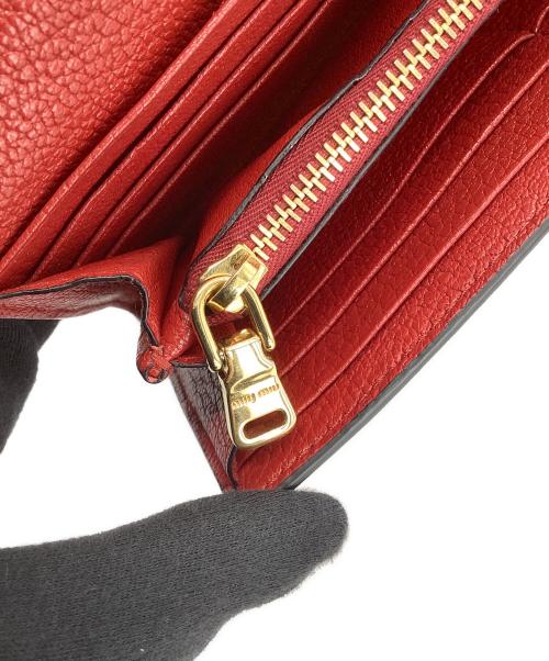 MIU MIU（ミュウミュウ）MIU MIU (ミュウミュウ) ジャガードロングウォレット レッドの古着・服飾アイテム