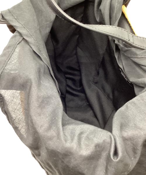 kurashi&trips publishing（クラシアンドトリップス パブリッシング）kurashi&trips publishing (クラシアンドトリップス パブリッシング) ころんと丸いカゴバッグ ブラウン×ブラックの古着・服飾アイテム