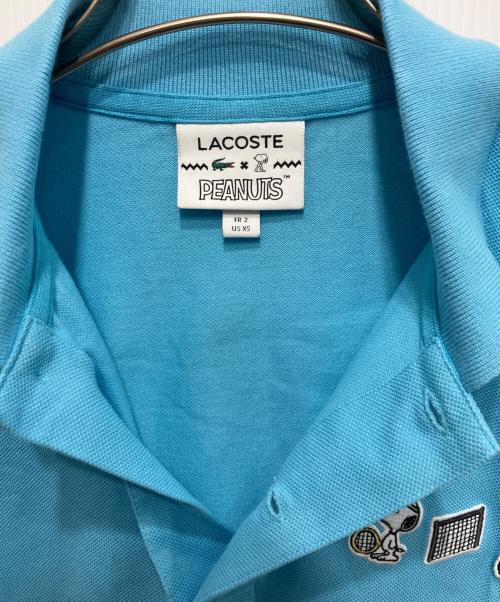 LACOSTE（ラコステ）LACOSTE (ラコステ) PEANUTS (ピーナッツ) ポロシャツ ブルー サイズ:XSの古着・服飾アイテム