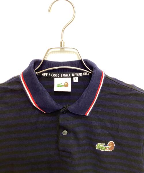 A BATHING APE（ア ベイシング エイプ）A BATHING APE (ア ベイシング エイプ) LACOSTE (ラコステ) コラボポロシャツ ネイビー サイズ:2の古着・服飾アイテム