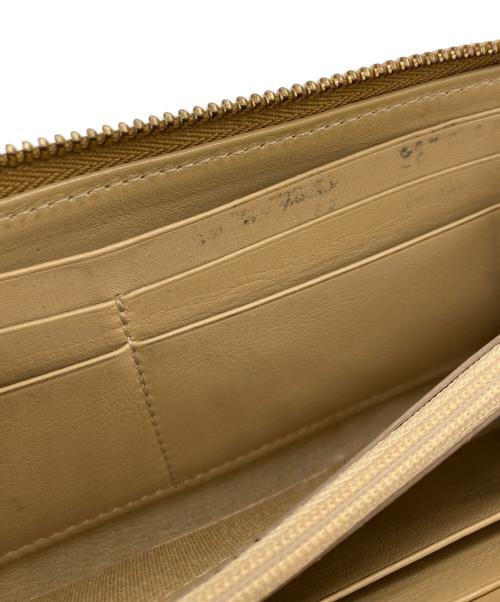 JIMMY CHOO（ジミーチュウ）JIMMY CHOO (ジミーチュウ) スタースタッズ長財布 ゴールドの古着・服飾アイテム