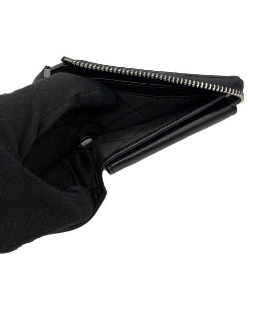 MICHAEL KORS（マイケル・コース）MICHAEL KORS (マイケル・コース) ラウンドファスナー財布 ベージュの古着・服飾アイテム