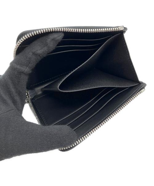 DRESSTERIOR（ドレステリア）DRESSTERIOR (ドレステリア) オーバーラップサークル Lジップウォレット ブラックの古着・服飾アイテム