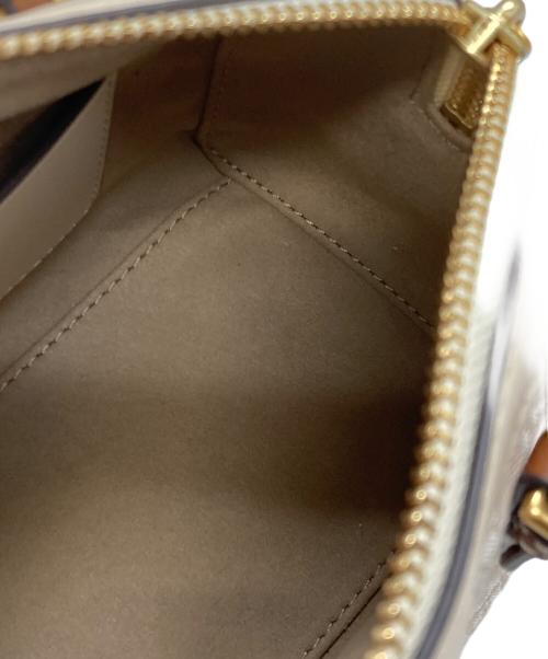 TORY BURCH（トリーバーチ）TORY BURCH (トリーバーチ) モノグラム ミニバレルバッグ ベージュの古着・服飾アイテム