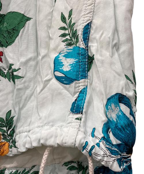 JUNYA WATANABE COMME des GARCONS MAN PINK（ジュンヤワタナベ コムデギャルソンマン ピンク）JUNYA WATANABE COMME des GARCONS MAN PINK (ジュンヤワタナベ コムデギャルソンマン ピンク) フラワープリントパンツ ブルー サイズ:Sの古着・服飾アイテム